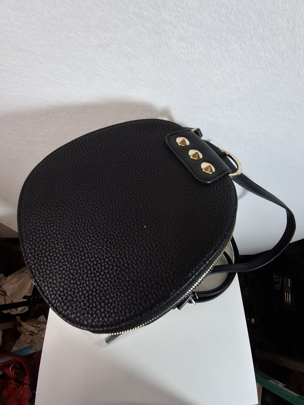 SWG Black Pebbled Sling Barrel Backpack with Gold Accents - Picture 2 of 11